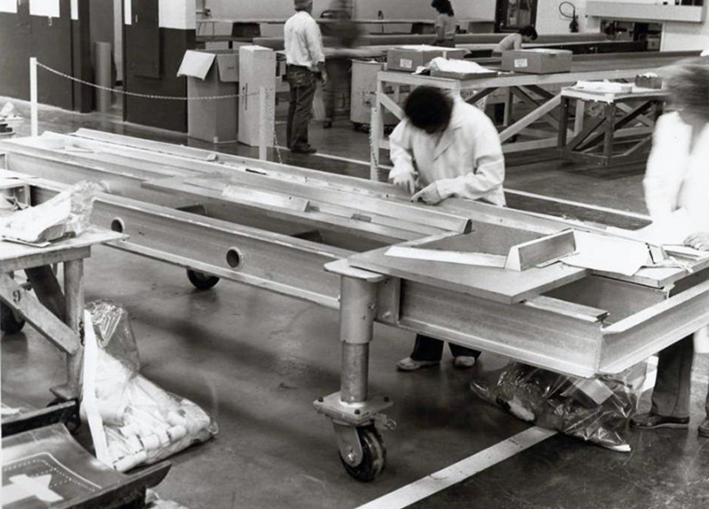 Sikorsky S-75 keel beam being layed up. The keel beams ran the length of the cabin and contained a raised reinforced section that supported the nose landing gear