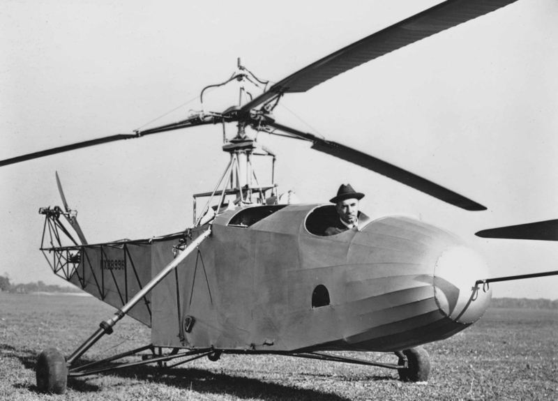 Igor Sikorsky in the VS-300A. Note the small passenger seat added directly in front of the transmission.